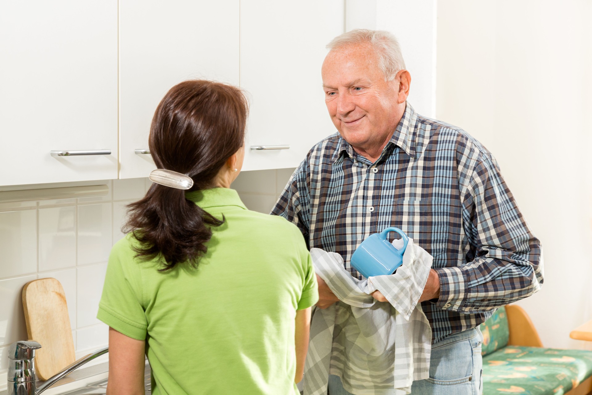 Senior man with home caregiver